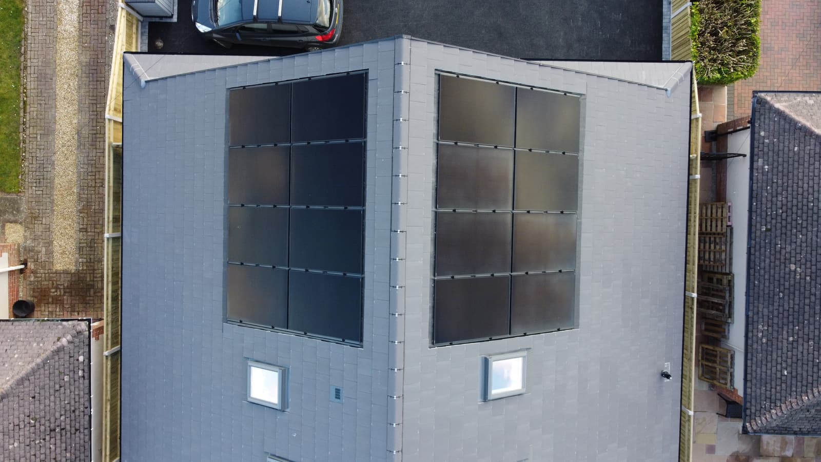 Aerial view of a new build home with in-roof solar panels
