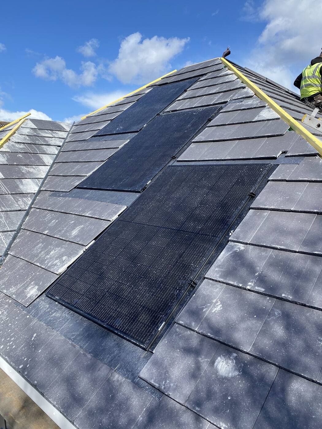 In-roof solar PV panels on a slate roof serviced by Solwat Green Maintenance
